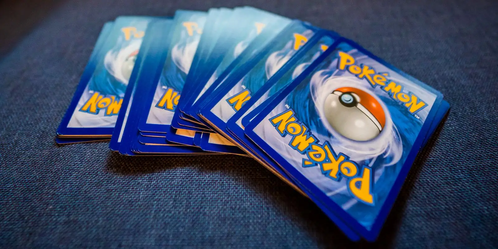 A spread of collectable trading cards on a table